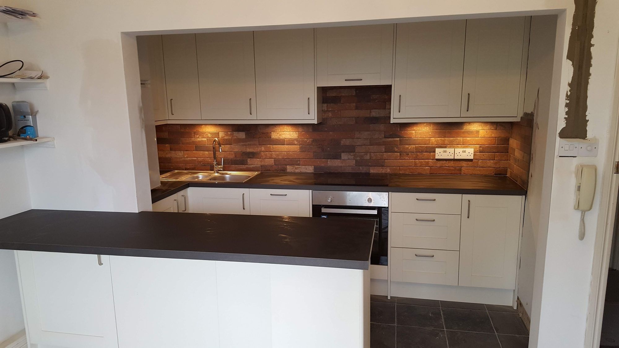 Kitchen with breakfast-bar peninsula