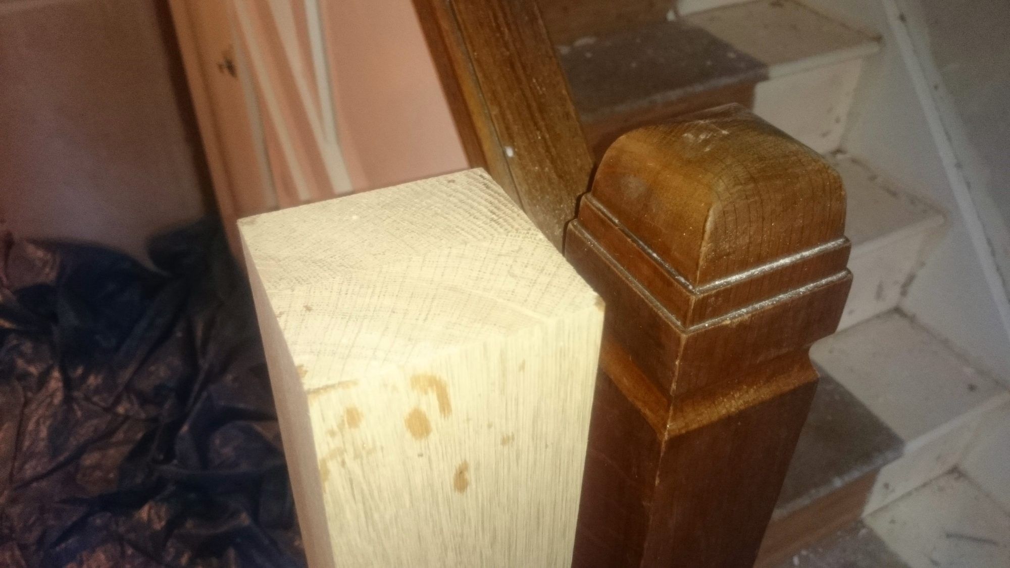 New oak newel post beside the old one