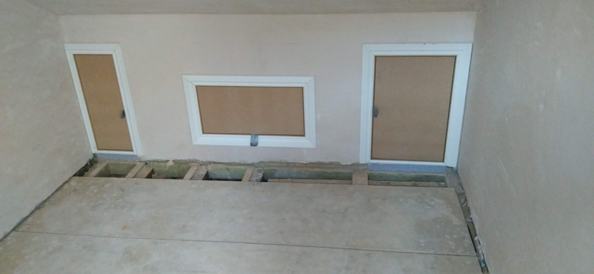 Eaves storage doors built into a top-floor room, Belgravia
